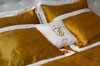 Комплект оздоровительного постельного белья, в состав которого входят инновационные композитные янтарные нити